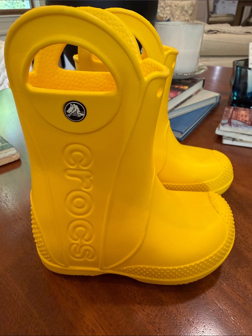 Crocs Kids' Handle It Rain Boots in vibrant yellow. Size 8